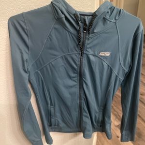 Kimes Ranch’s woman’s Lovell zip up workout wear
